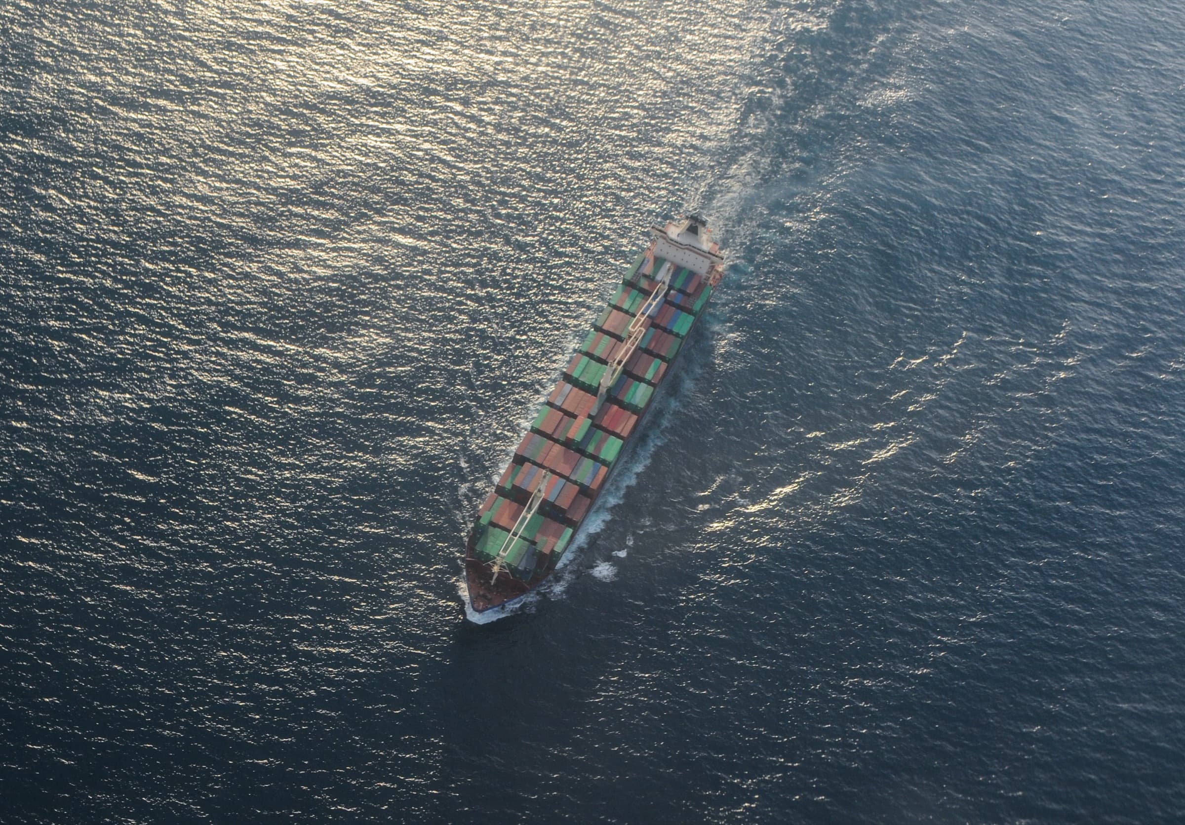Aerial view of a container ship under way at sea
